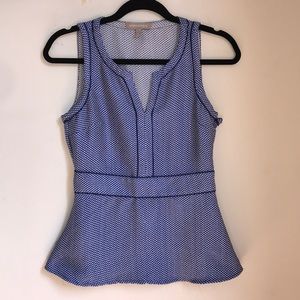 Peplum top with zip closure up the side